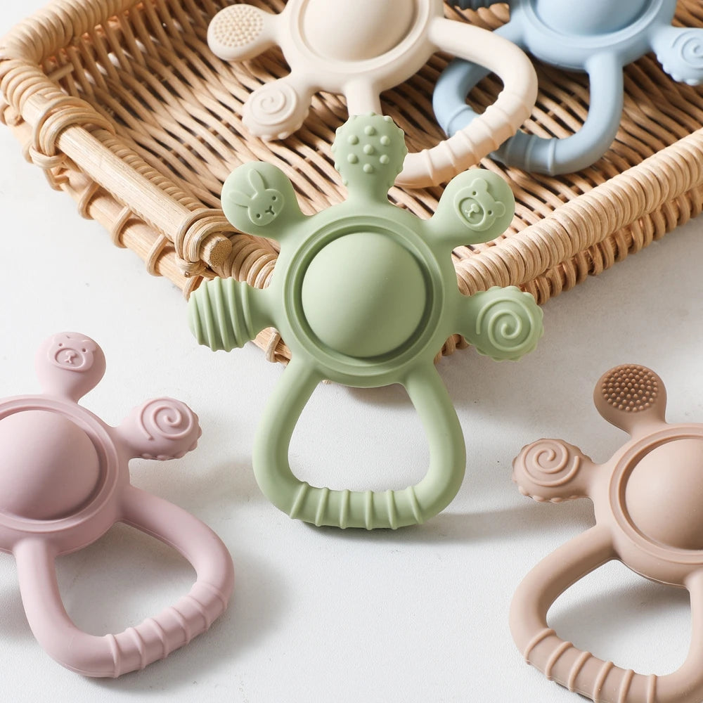 Baby Ollie “ChewBloom” Teether Rattle